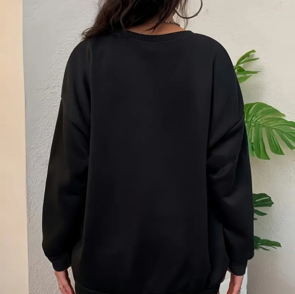 Black hoodie with white lettering on front. It will keep you warm this winter. - Picture 2 of 4